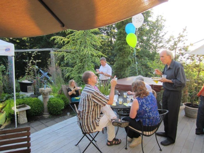 Potluck outdoors at John Doan home summer concert.