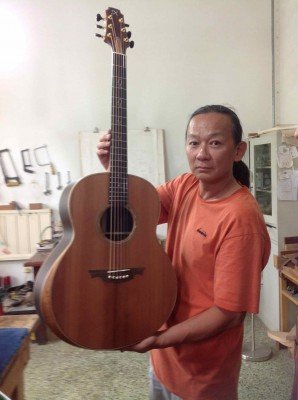 30. Mr. Xi with Guitar